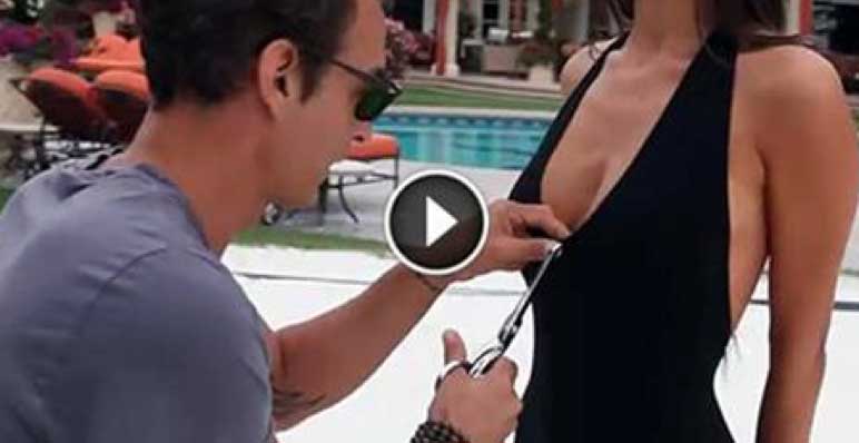 ▶ Guy Takes A Pair Of Scissors And Turns A Cheap Swimsuit Into an Expensive Designer Piece. NICE!